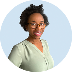 Virtual remote headshot example of casual woman on light blue backdrop